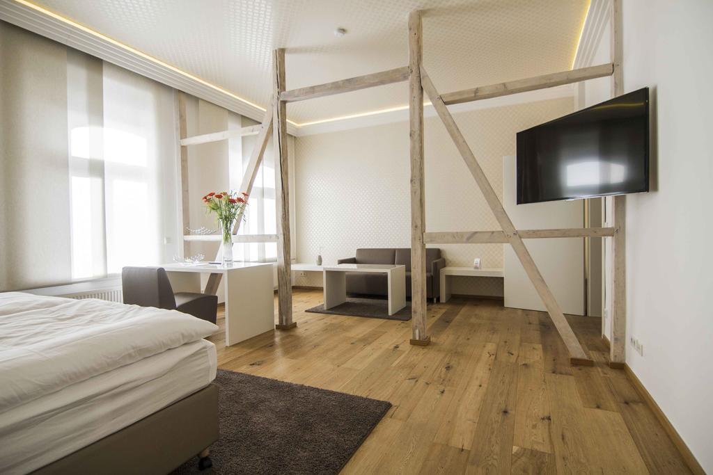 Helvetia Suites Düsseldorf Rum bild